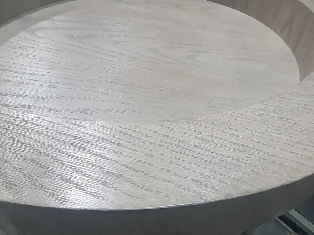 Round pet bed in grey oak veneer from the US programme