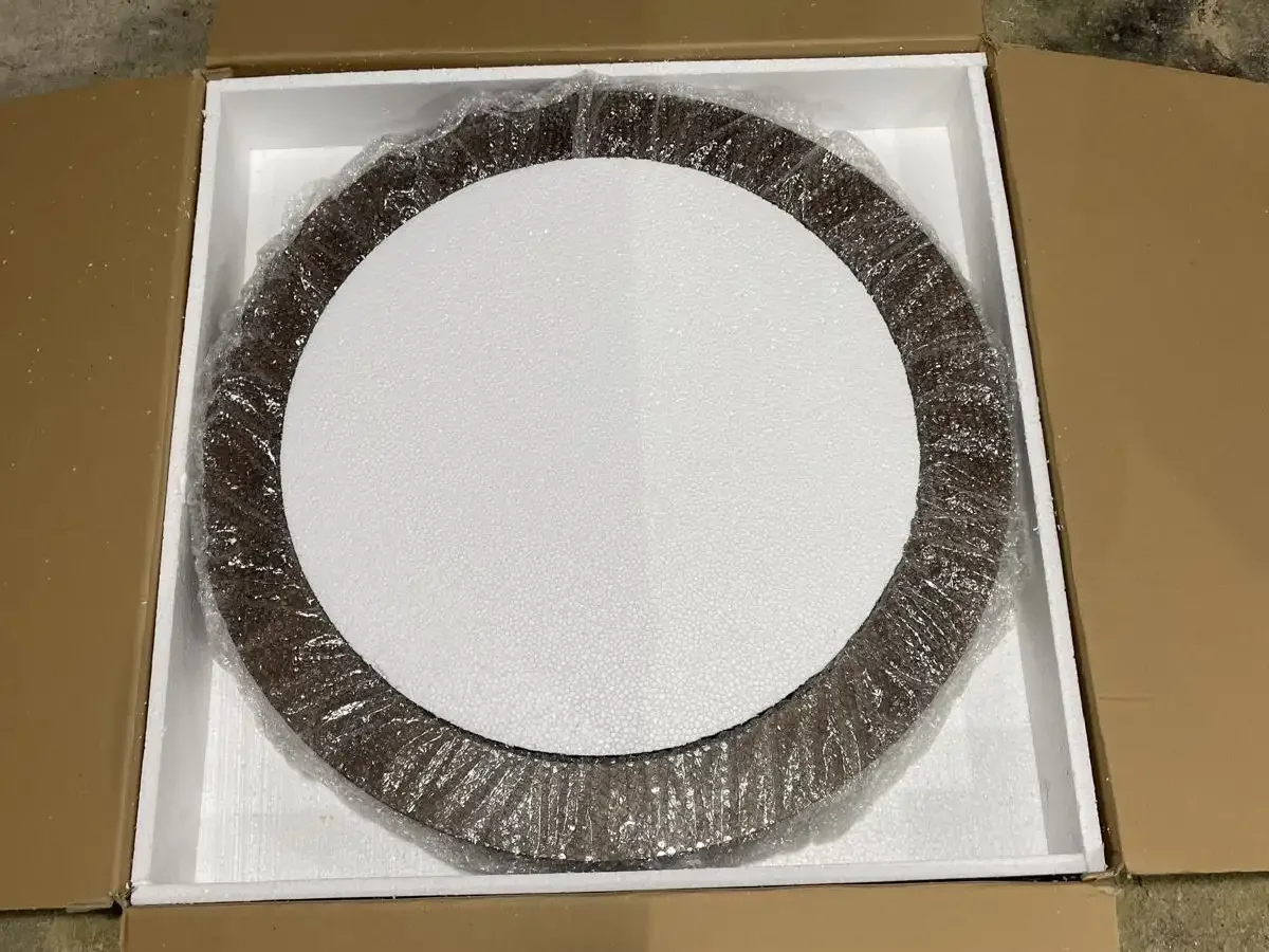 Round pet bed packed in foam inside an export carton