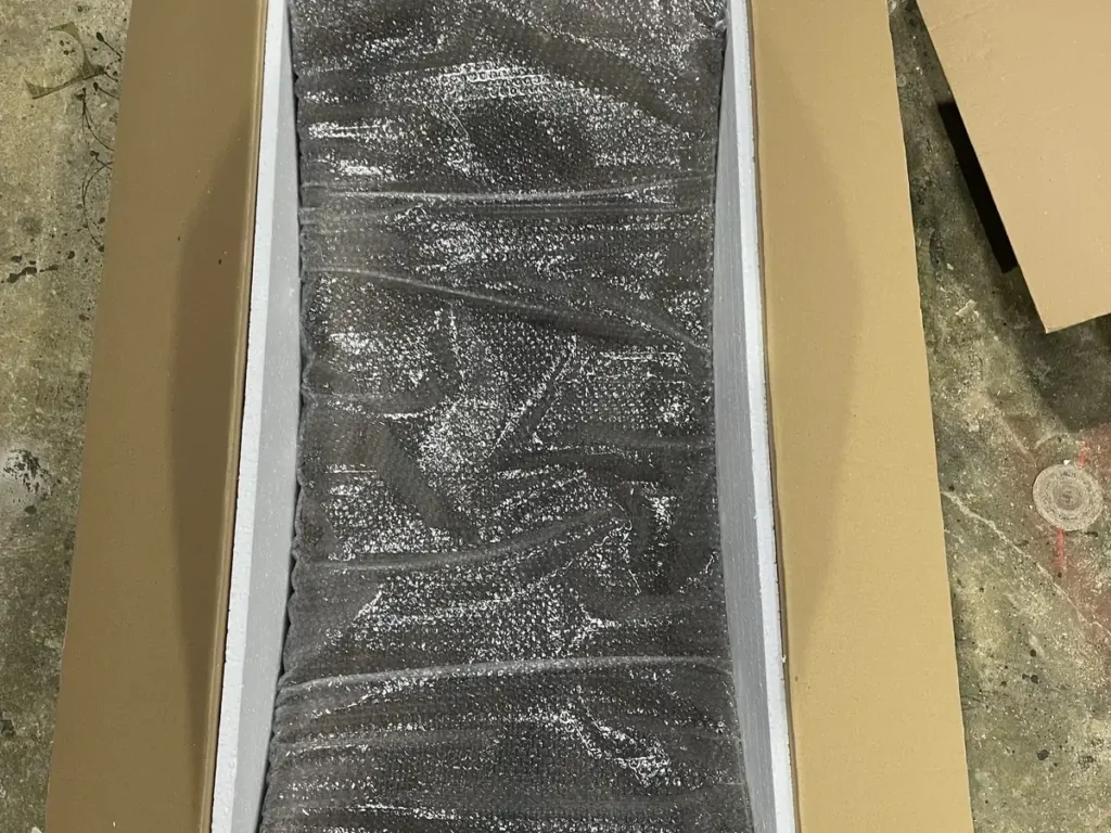 Bent-plywood pet beds packed in an export carton